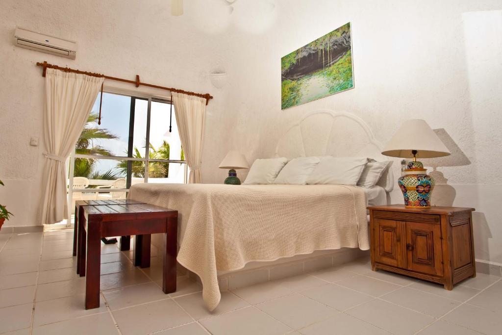 אקומל Villas Flamingo חדר תמונה