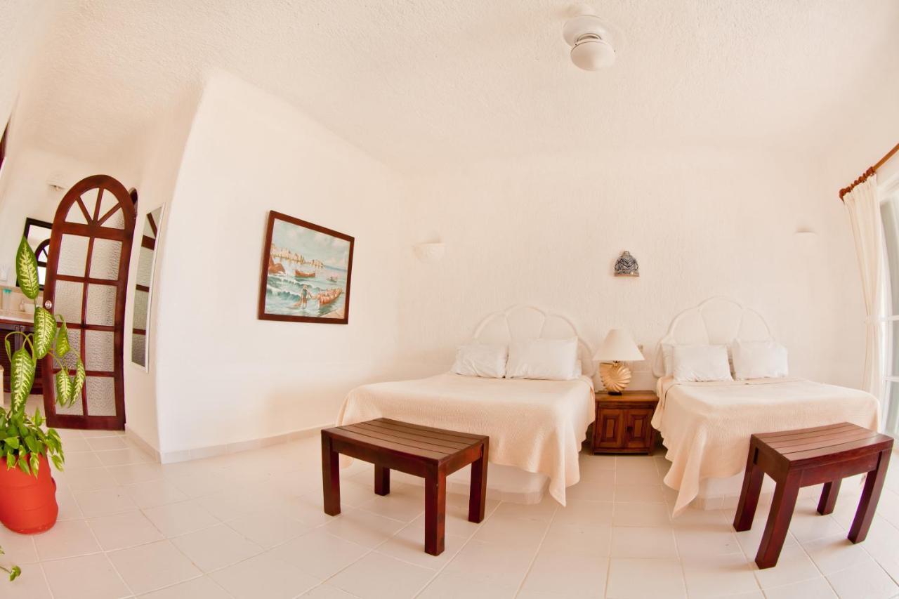 אקומל Villas Flamingo חדר תמונה